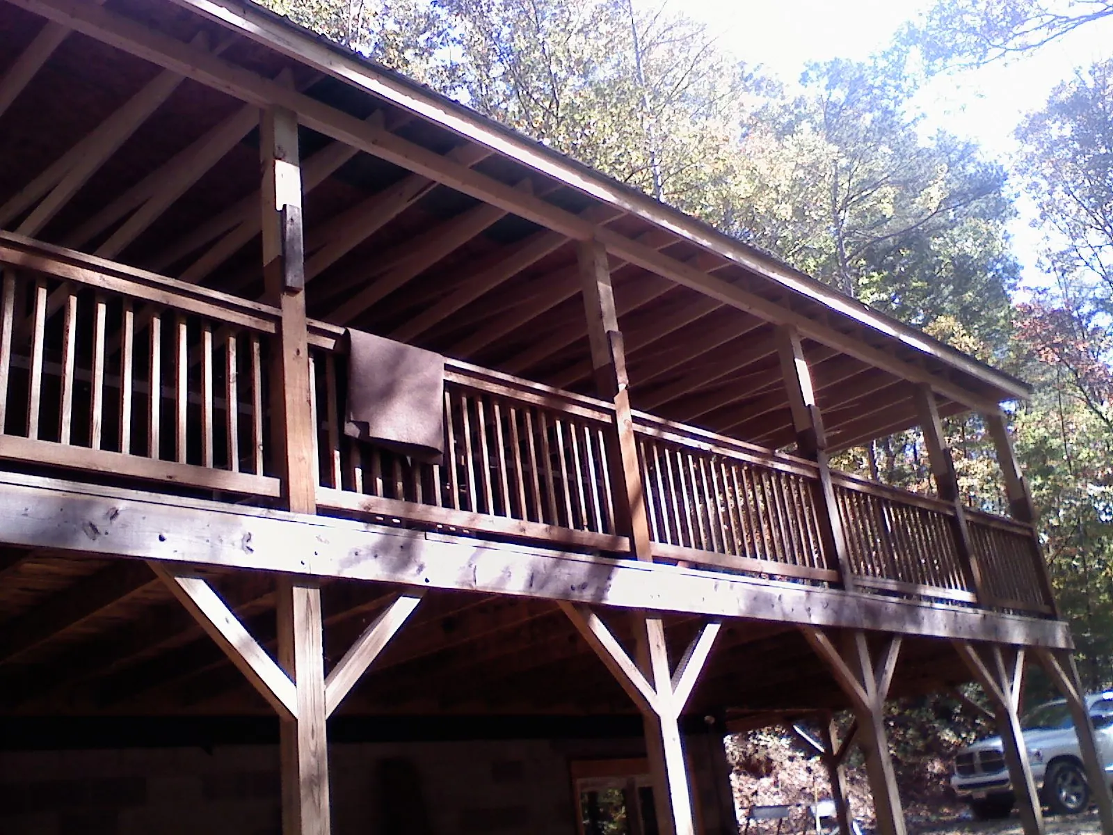 Timber framing under a new elevated porch and deck — Roof Leak Repair in Hamler by Roofing Brothers